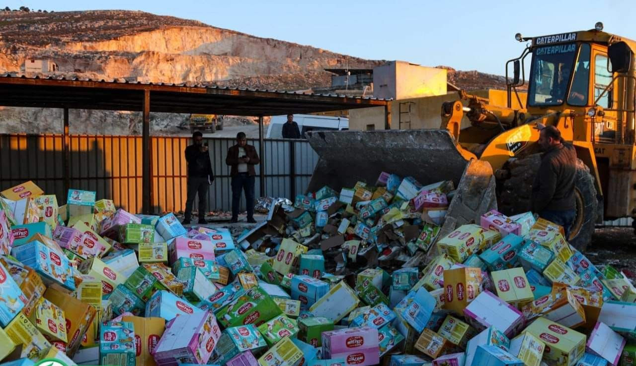 إتلاف آلاف علب الحليب في عفرين