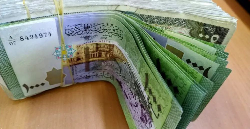سعر صرف الليرة أمام الدولار ال...