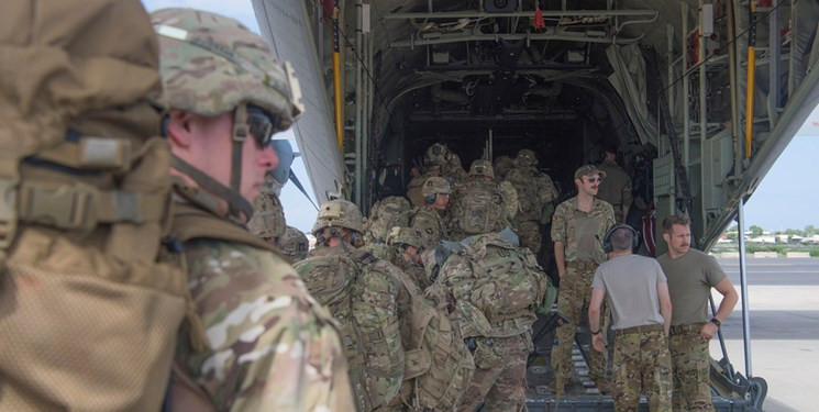 "النجباء" العراقية تتوعد بايدن...