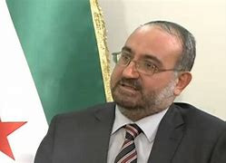رئيس وفد المعارضة السورية أحمد...