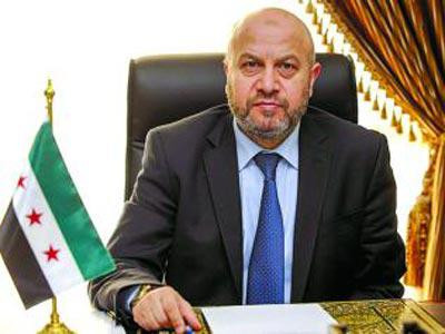 وفد من الائتلاف الوطني إلى الد...