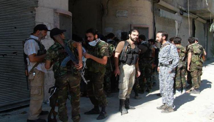 13 شهيدا مدنيا ضحايا الاشتباكا...