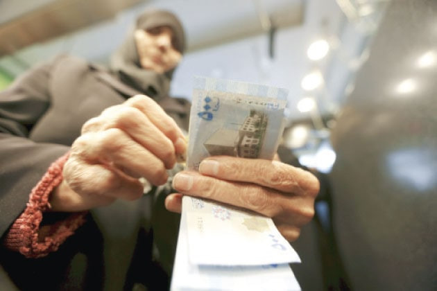 سعر صرف الليرة مقابل الدولار ا...