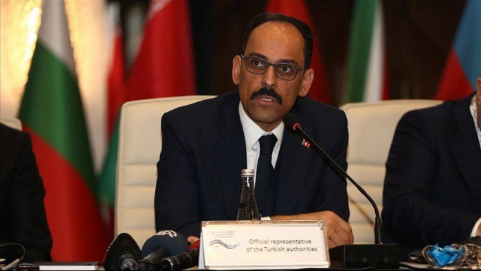 إبراهيم قالن: حل أزمة اللاجئين...