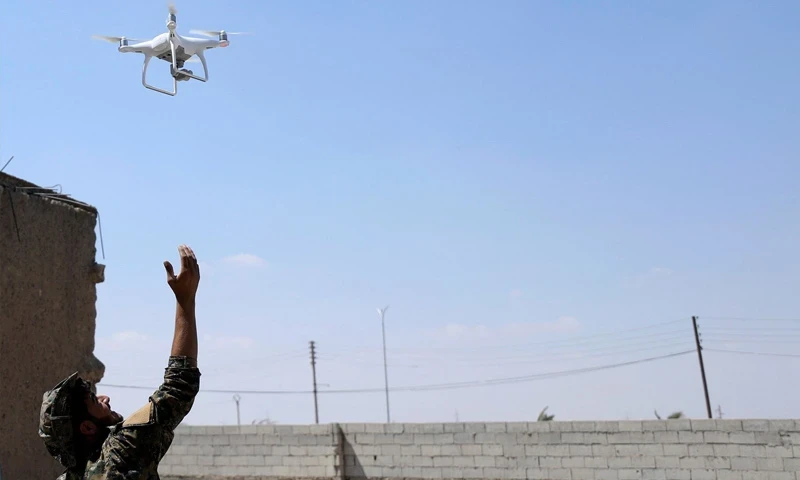 اشتباكات بين "قسد" والجيش السو...