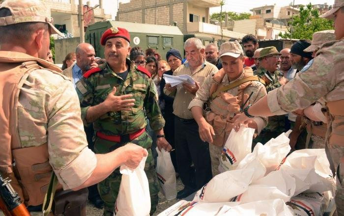 الدفاع الروسية توزع مساعدات "إ...