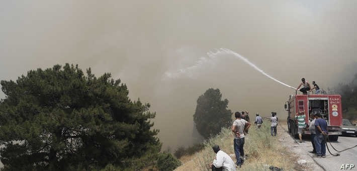 حريق في شمال لبنان يمتد إلى مح...