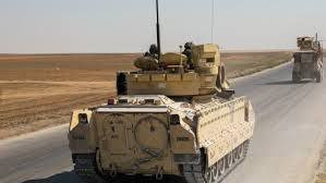 القوات الأمريكية تسير دورية في...