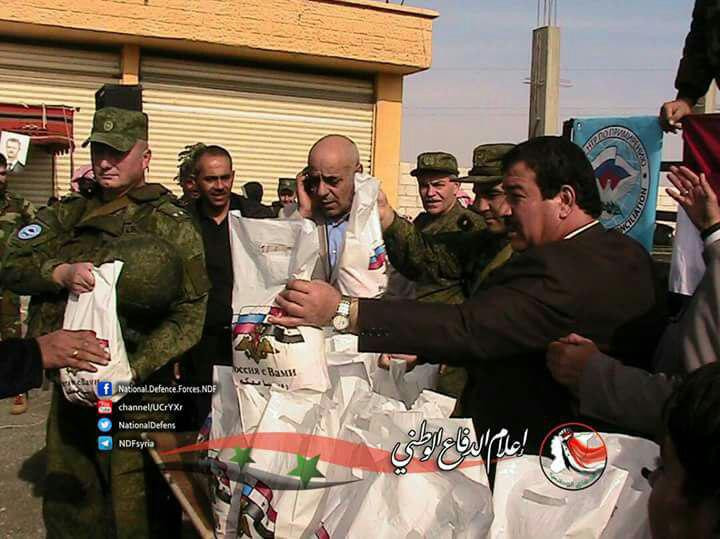 النظام يوزع مساعدات على مواليه...