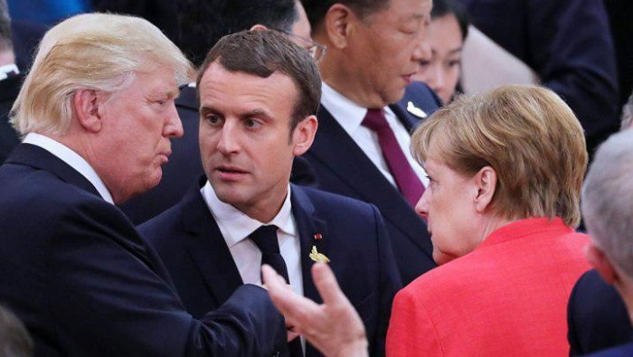 ترمب يتفق مع ماكرون وميركل على...