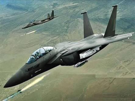 التحالف يقتل 12 عنصرا لتنظيم ا...