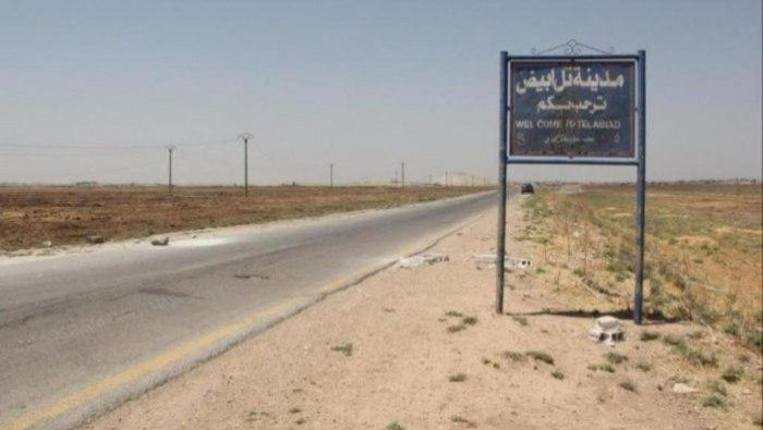 "الوحدات الكردية" تزيل صور قتل...